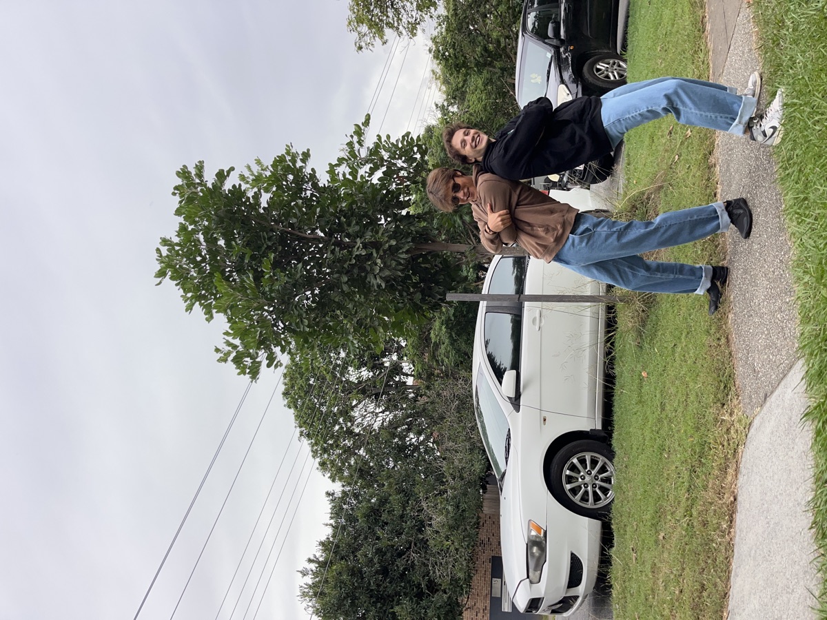 Giacomo and Isaac laughing together outside their Australian home